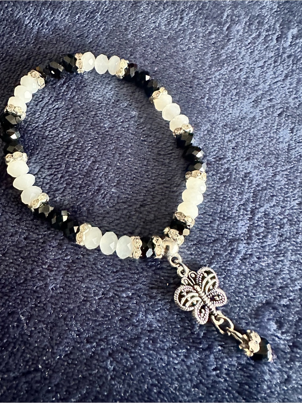 Elegant Black & White Beaded Bracelet with Silver Butterfly Charm
